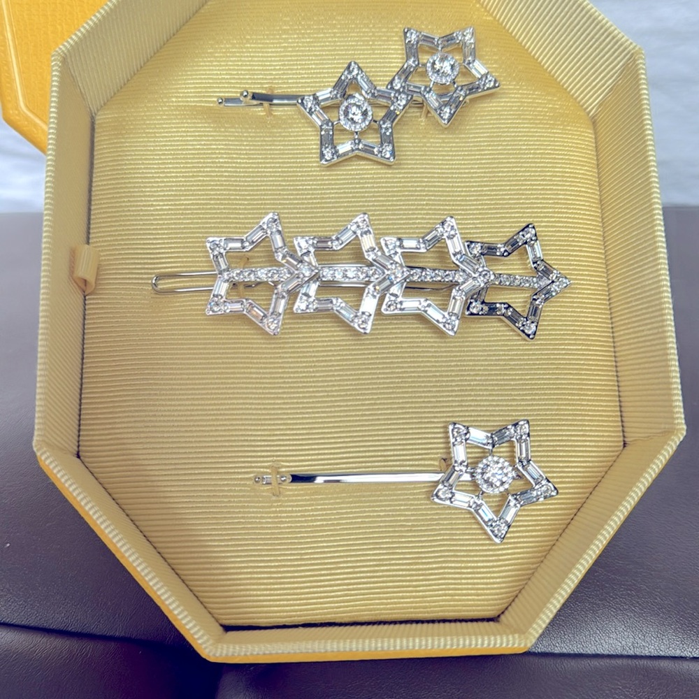 Swarovski crystal 3 piece star hair clips.